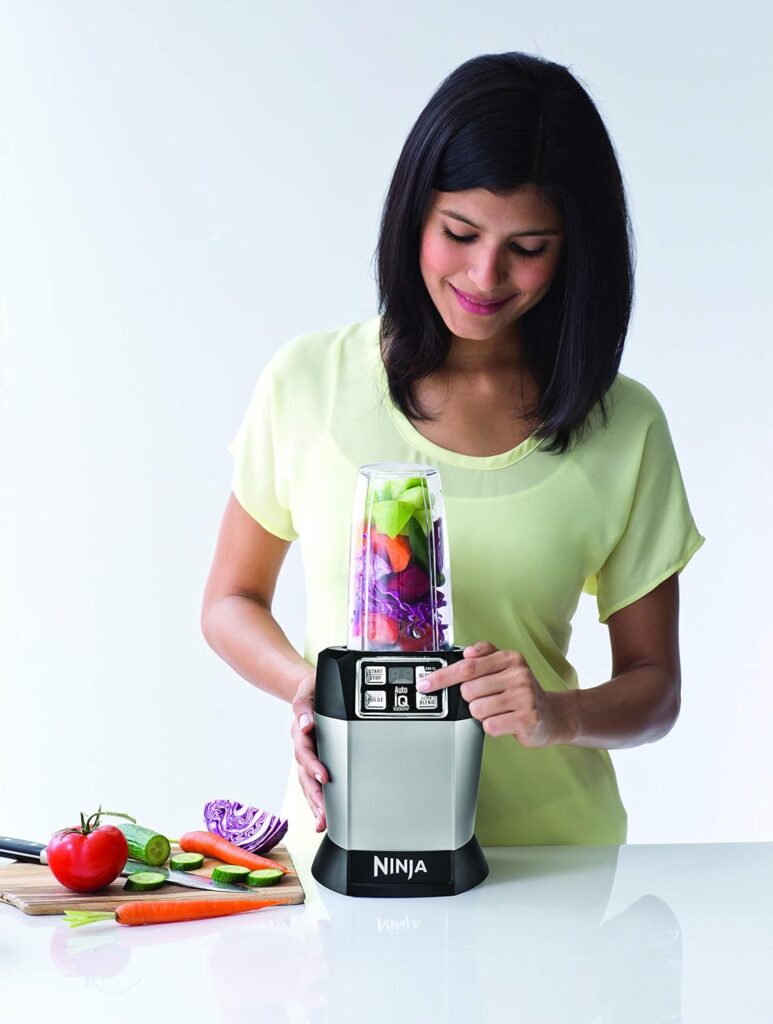 Ninja BL480D Nutri Personal Countertop Blender, Auto-iQ Technology, 1000-Watts, for Frozen Drinks, Smoothies, Sauces  More, with 18-oz.  24-oz. To-Go Cups  Spout Lids, Black/Silver